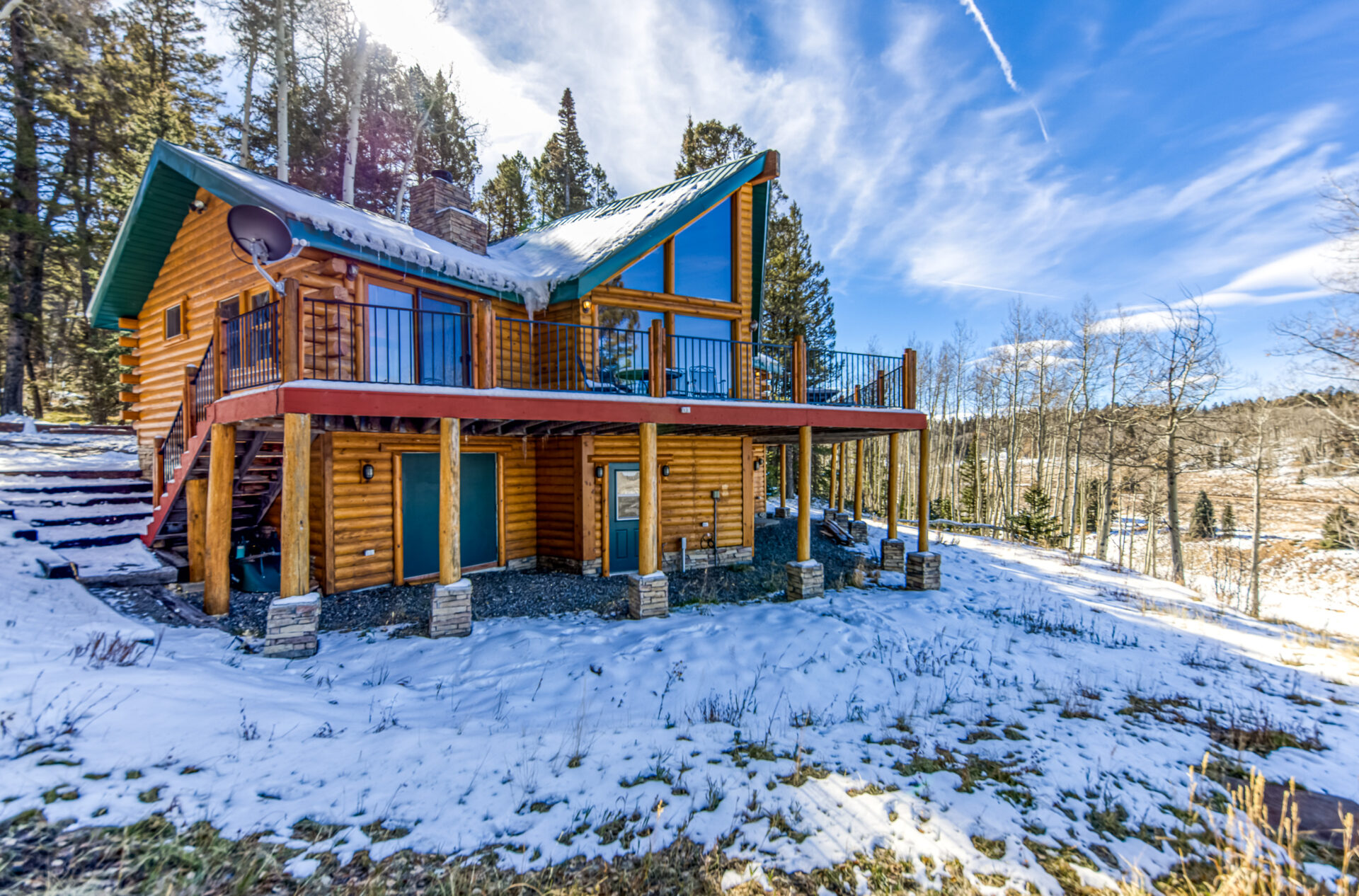 March Cover Property — Stunning Log Home in Cimarron